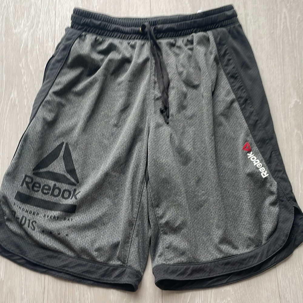 Men’s Reebok shirts. Medium